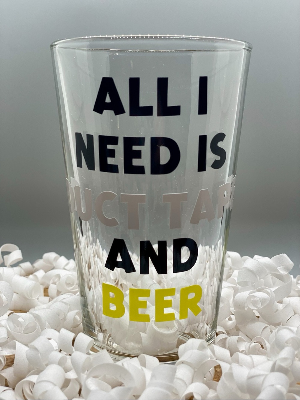 Glass Pint with Bold Script 'All I Need Is Duct Tape and Beer'